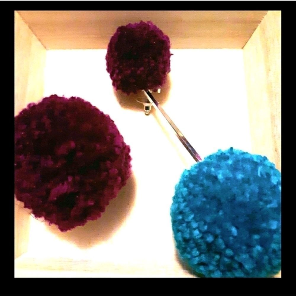 TULESTE POM POM ASYMMETRICAL EARRINGS